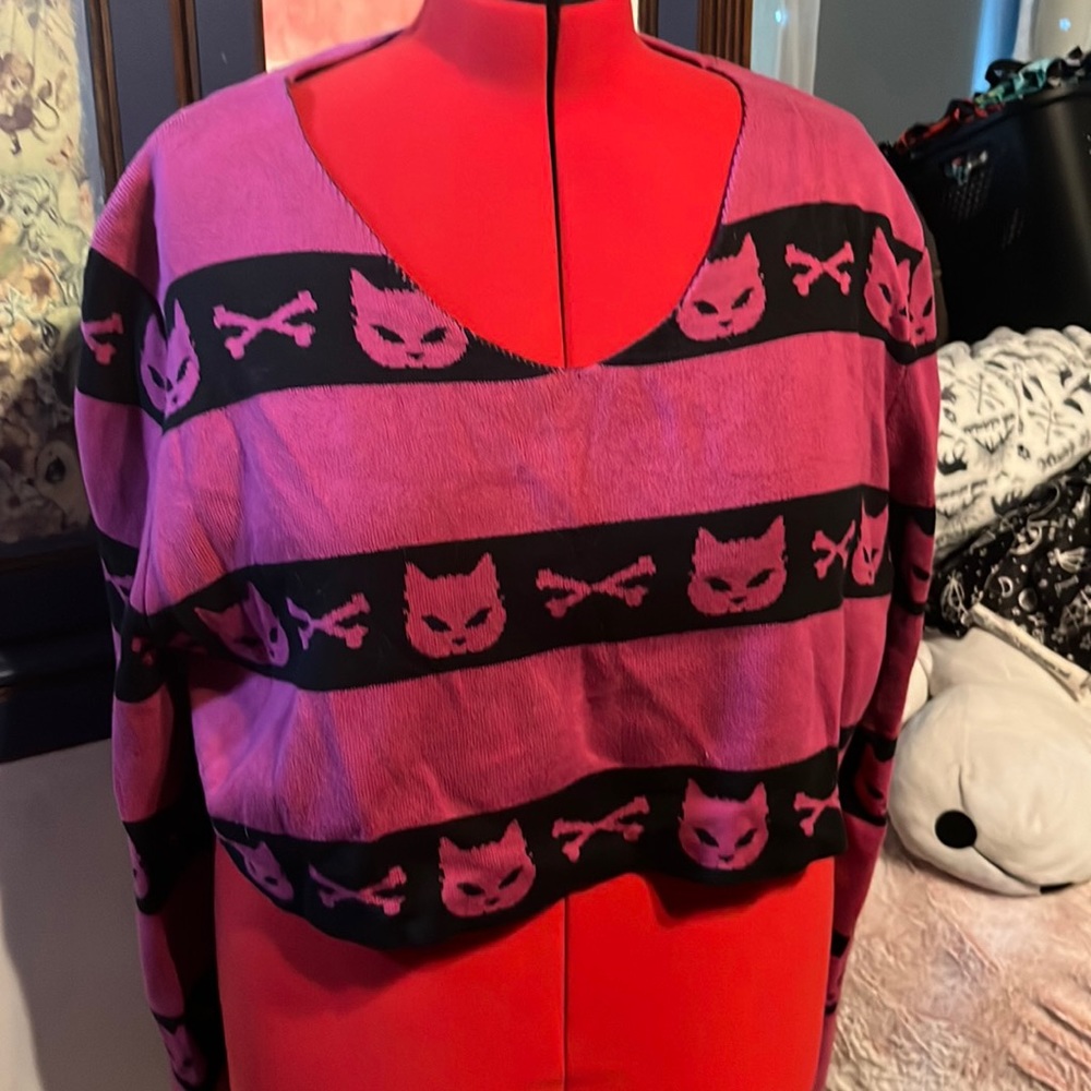 Dolls kill “Widow” magenta super creep striped sweater